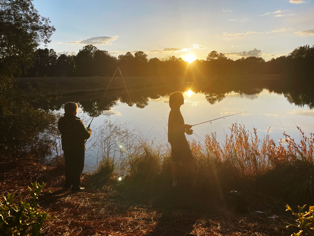 Kids fishing at the lake